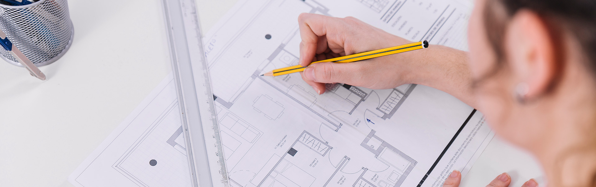 AutoCAD Drafting Technician drawing blueprints.  
