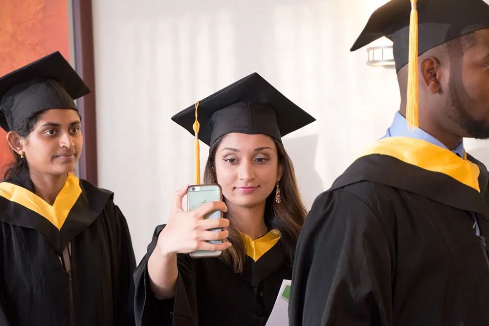 Female graduate taking a selfie