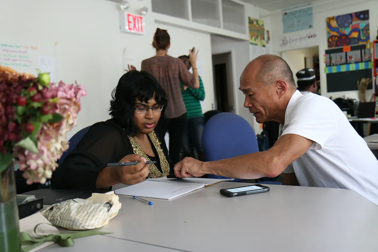 Person receiving help from fellow student